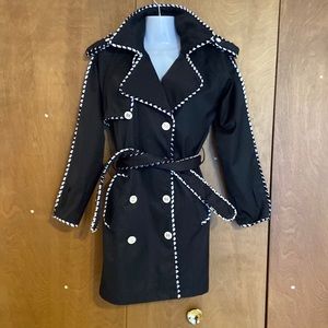 Faux Channel Short trench coat.